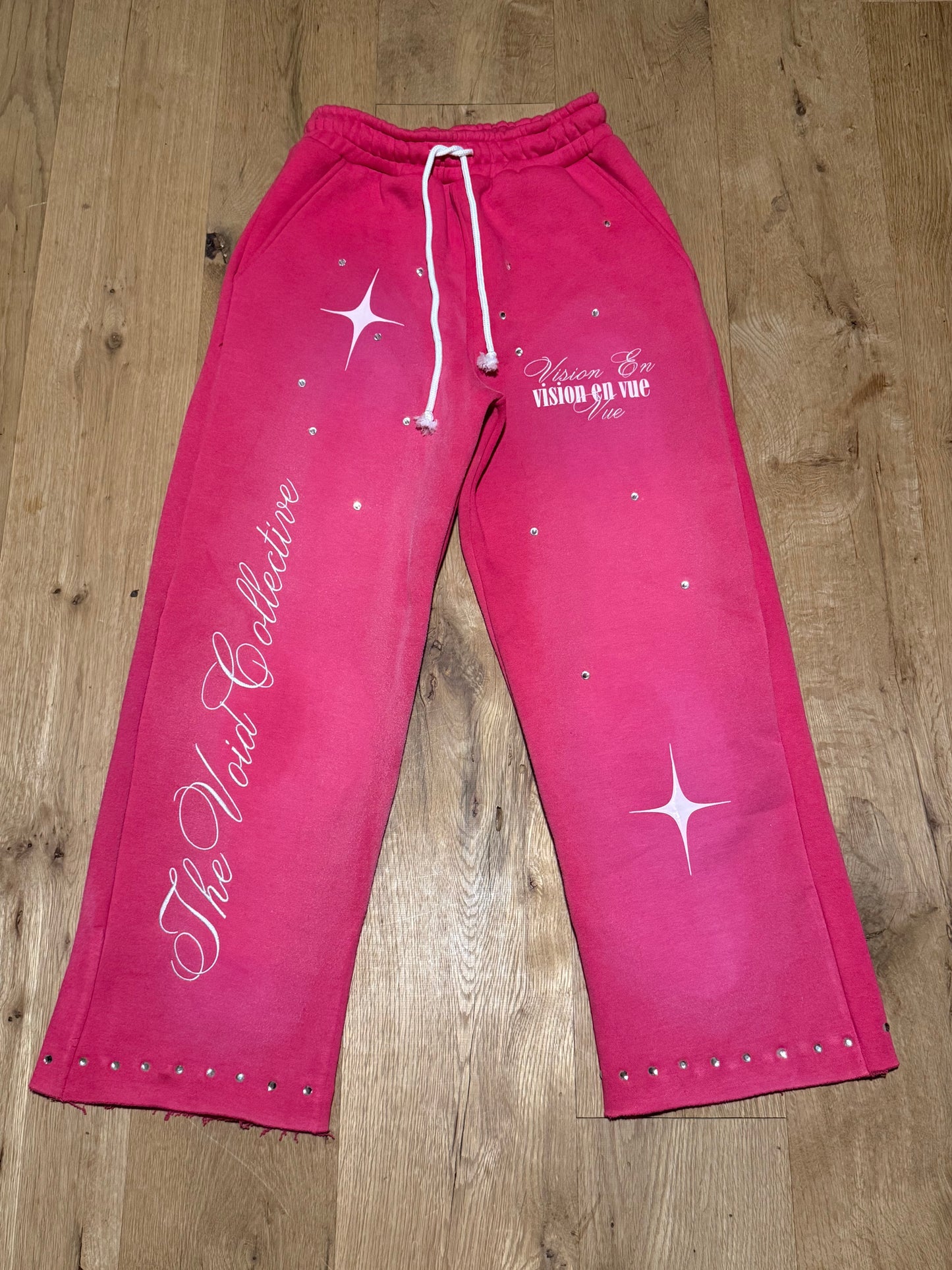 “vision en vue” pink sweats